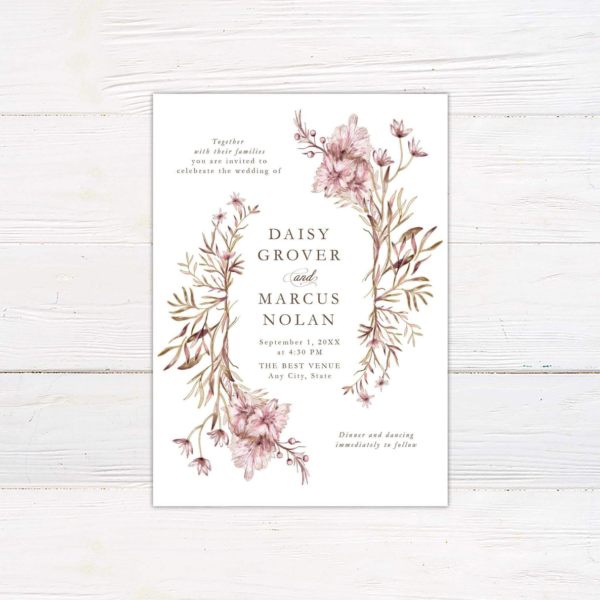 A wedding invitation features elegant watercolor floral arrangements in muted pink and brown tones framing the text. The typography is a mix of serif and script fonts, creating a sophisticated and romantic feel. Event details, including the date, time, and venue, are clearly displayed in a balanced layout. This design exudes timeless elegance, making it perfect for vintage, boho, or garden-inspired wedding celebrations.