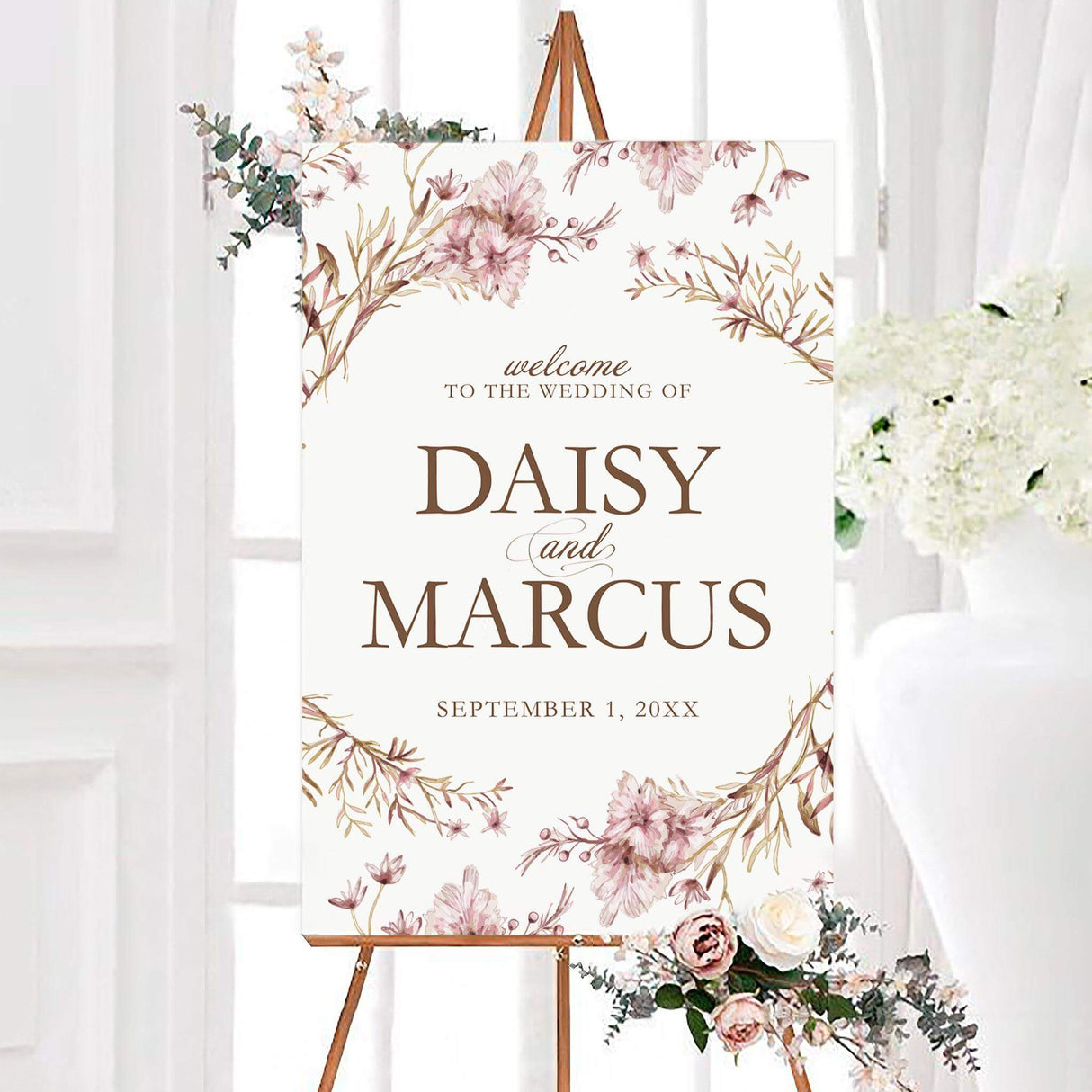 Dainty branches wedding welcome sign featuring delicate blush watercolor wildflowers and branches surrounding elegant personalized typography. The sign includes the couple’s names and wedding date on a clean white background.