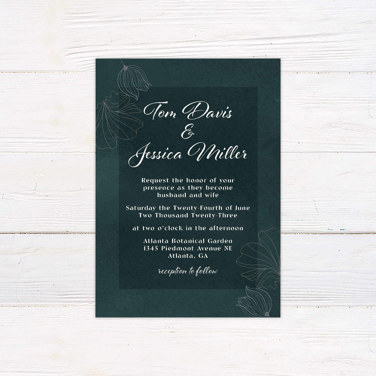 Dark green wedding invitation with white floral line art, elegant script names, serif body text, and a rich botanical background