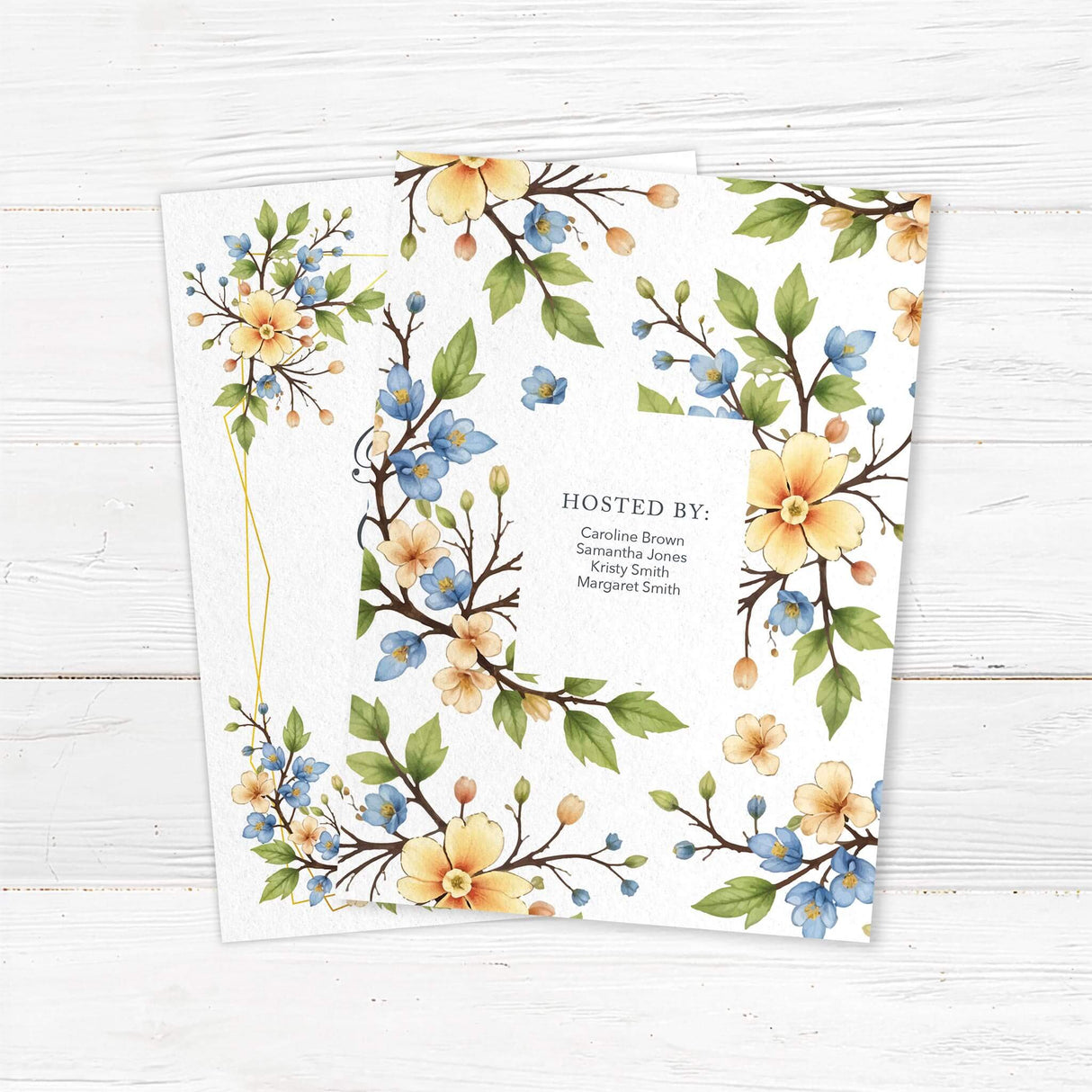 Elegant printed bridal shower invitation with pastel watercolor flowers in yellow and blue, arranged in a decorative geometric border. Features script and serif fonts with customizable shower details. Professionally printed on white background. back