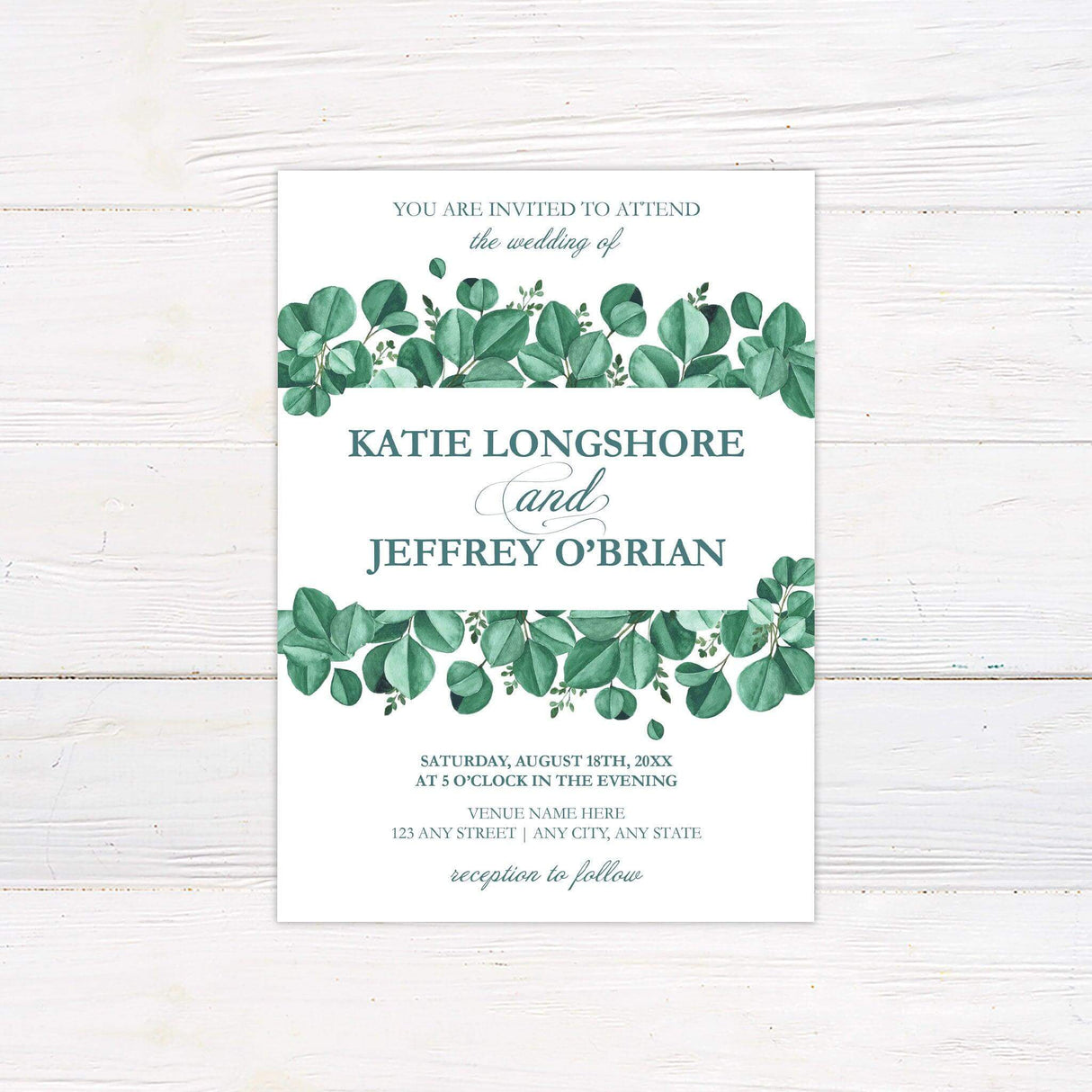 Wedding invitation with watercolor eucalyptus greenery border in deep green tones, featuring serif and script fonts on a white background.