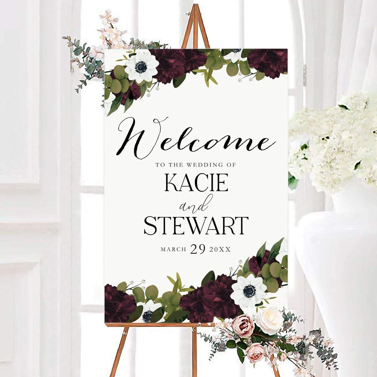 Personalized deep maroon botanicals floral wedding welcome sign featuring deep maroon flowers, white anemones, eucalyptus greenery, and elegant black lettering. The romantic floral wedding sign includes customizable couple's names and wedding date on a clean white background.