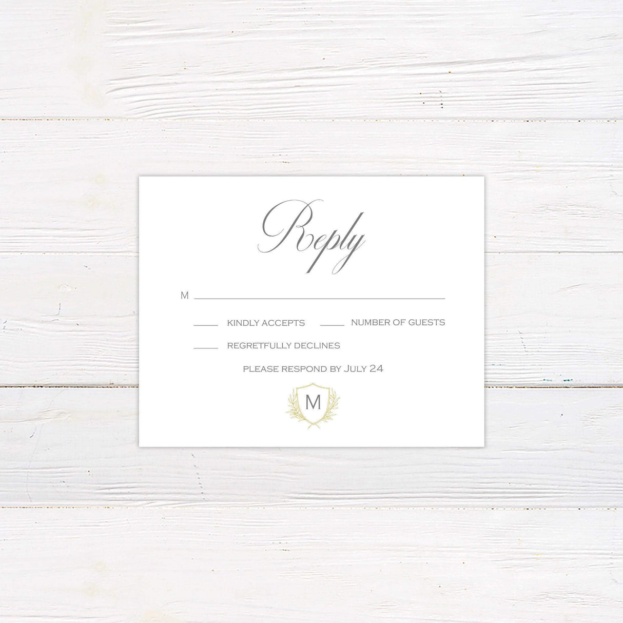 Elegant delicate shield invitation reply card with monogram crest and laurel design on ivory background for wedding RSVP