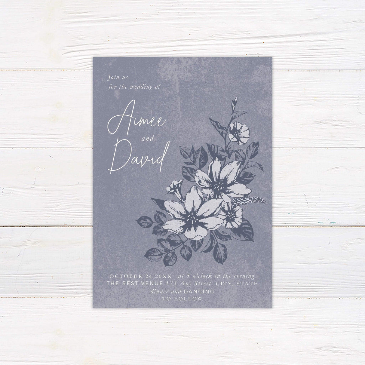 Elegant distressed blue wedding invitation with hand-drawn white florals, customizable with wedding details for a rustic or vintage celebration.