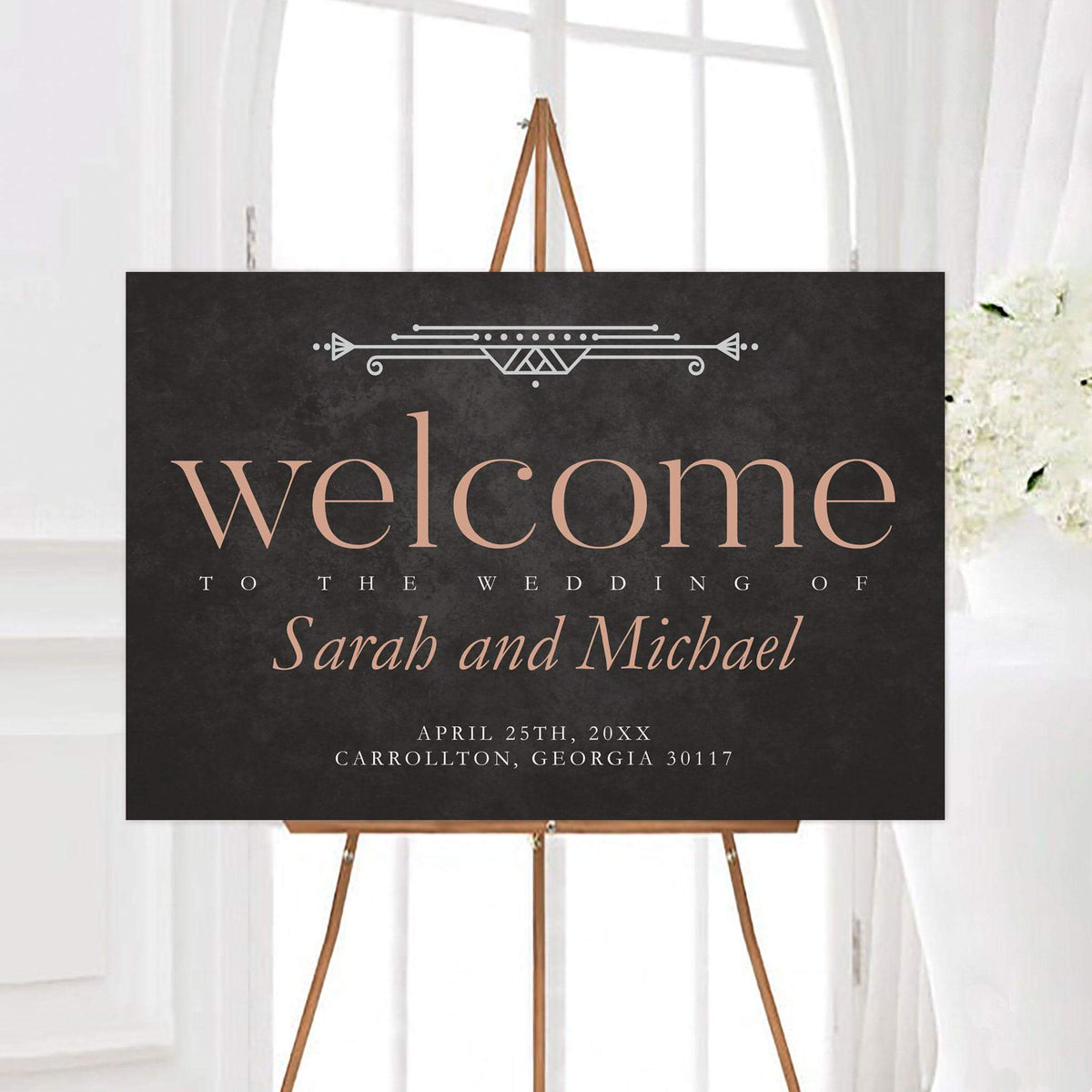 East Egg Gatsby wedding welcome sign featuring a dark textured background and elegant vintage-inspired typography. The sign includes a geometric accent with personalized names, wedding date, and location.