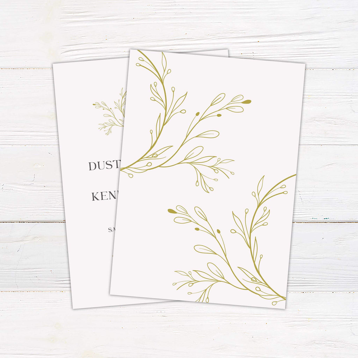 Wedding invitation with gold botanical wreath monogram, serif and script fonts, minimalist white background and formal event layout = back