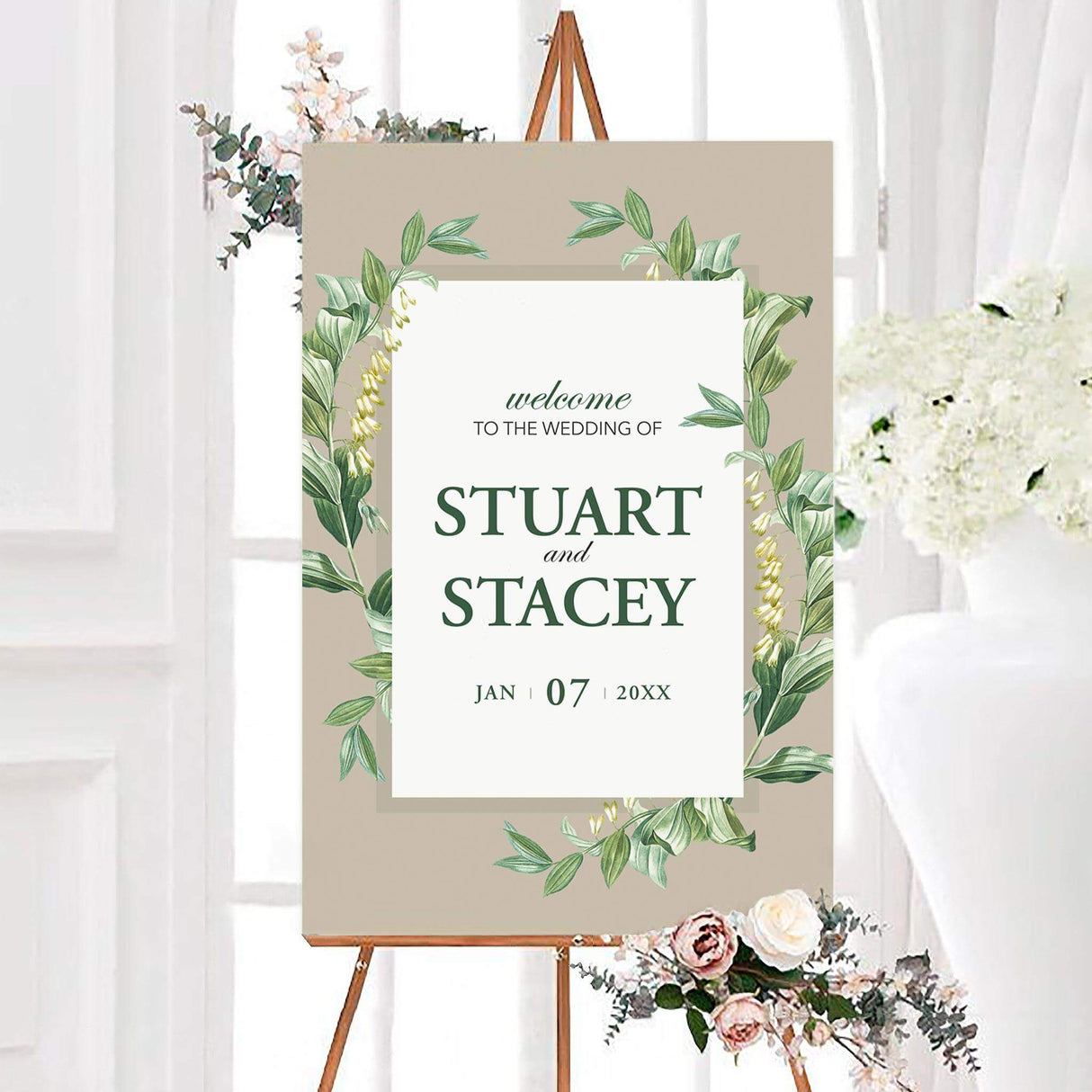 Personalized elegant green botanical wedding welcome sign featuring lush green botanical leaves surrounding a clean white center. Elegant green typography displays the couple’s names and wedding date in a sophisticated nature-inspired design.