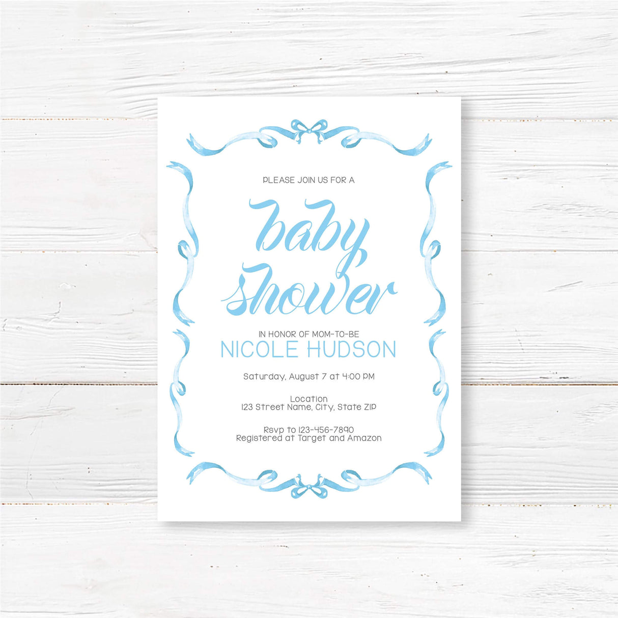 Elegant Ribbons Baby Shower Invitation with blue script and ribbon border, featuring event details for mom-to-be, Nicole Hudson.