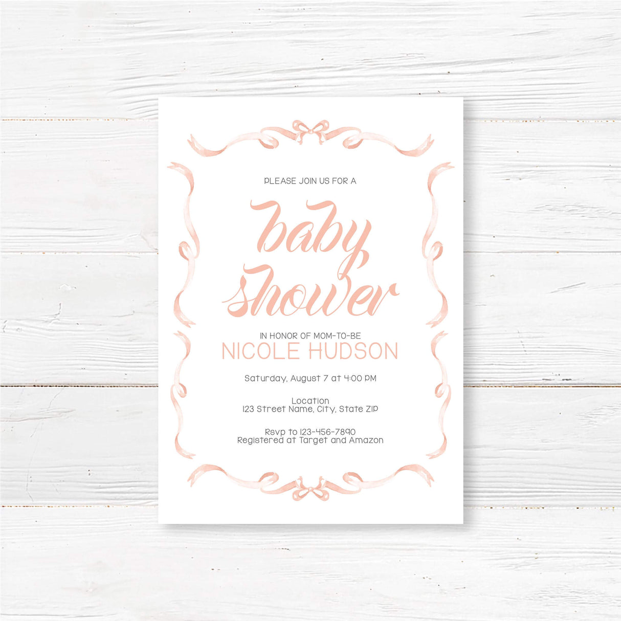 Elegant ribbons baby shower invitation with flowing script and whimsical border, featuring event details for Nicole Hudson's baby shower.