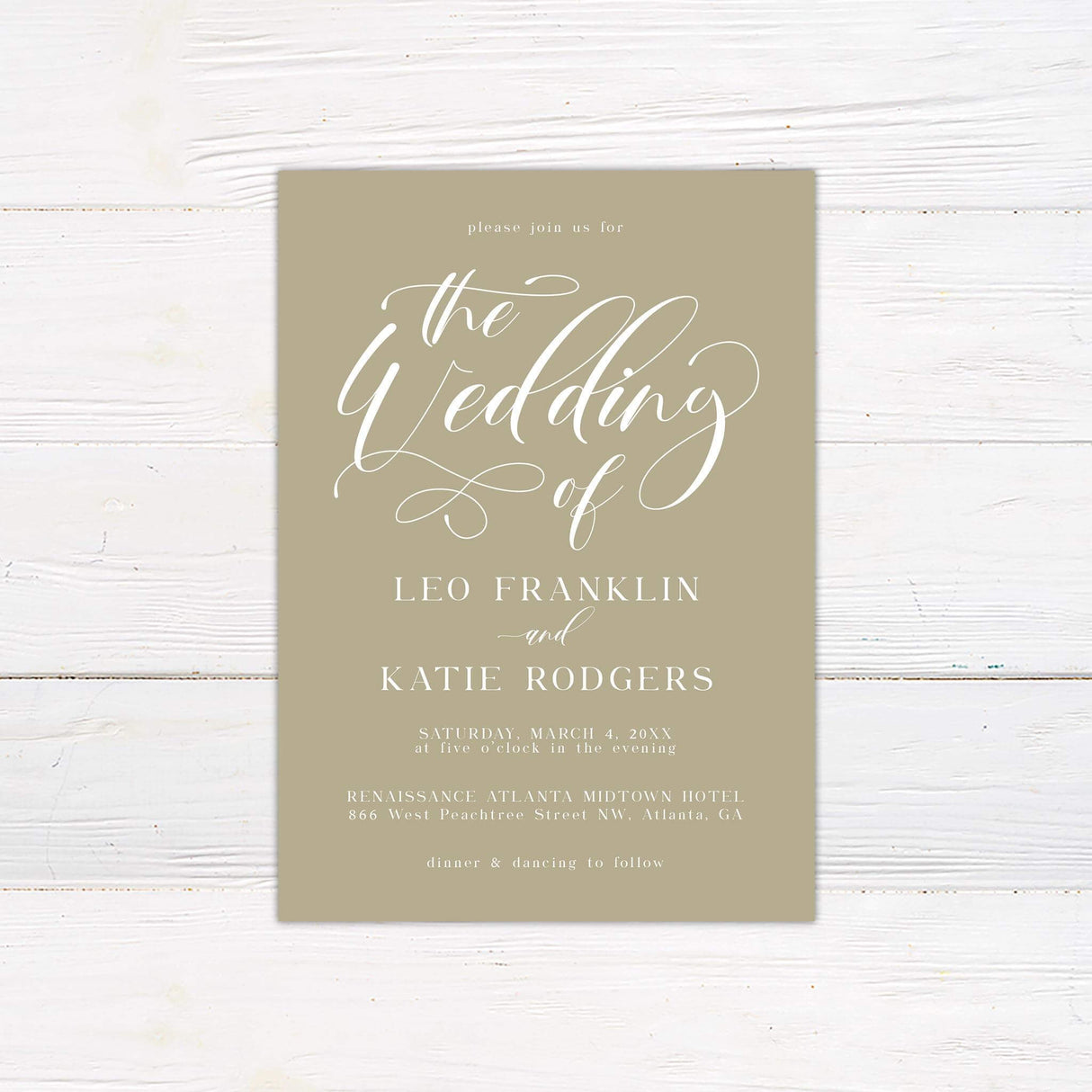 Wedding invitation with elegant white script calligraphy and serif text on a taupe background, featuring formal event details and a romantic design layout.