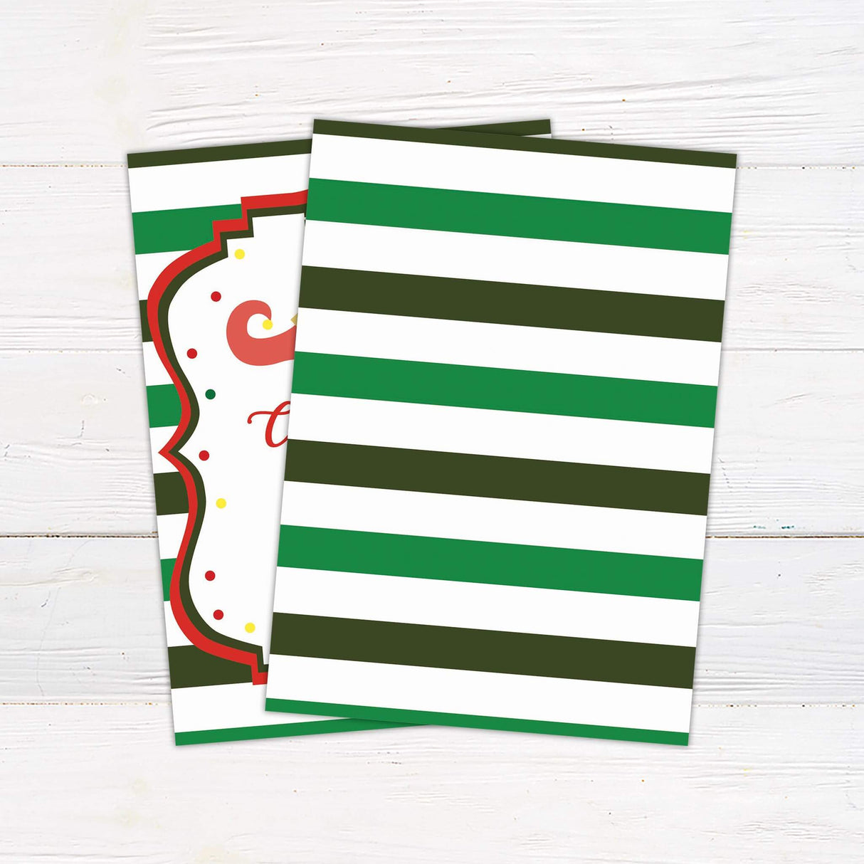 A Christmas party invitation with playful festive text and colorful decorations. The design features a cheerful holiday theme with a fun style. - back side.