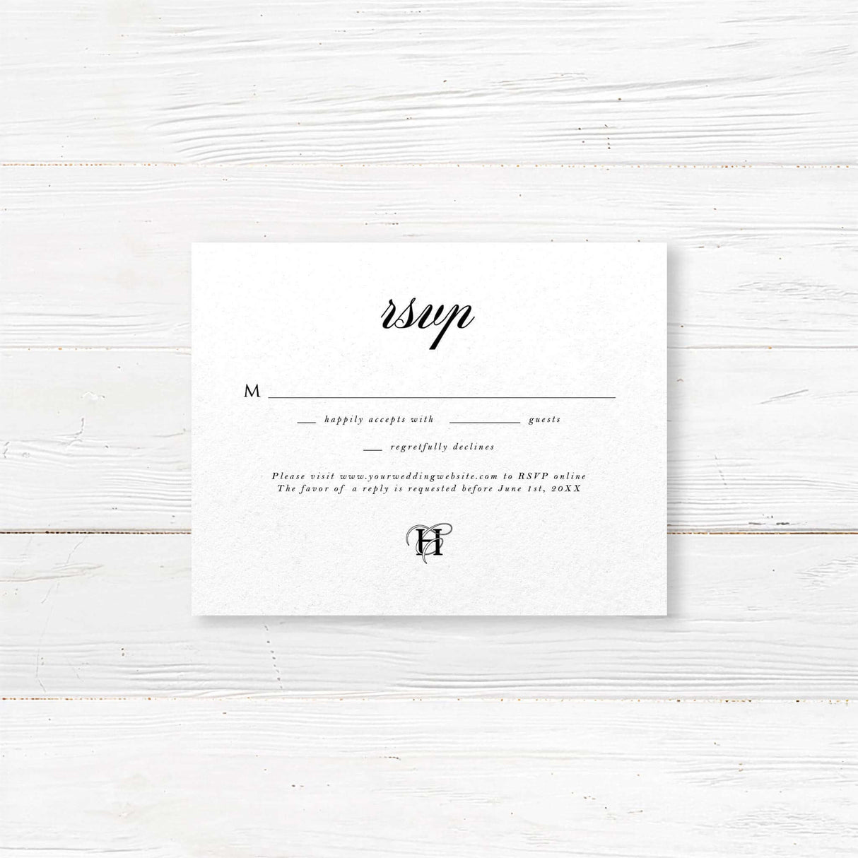 Classic black and white wedding RSVP card with elegant serif font and minimalist design