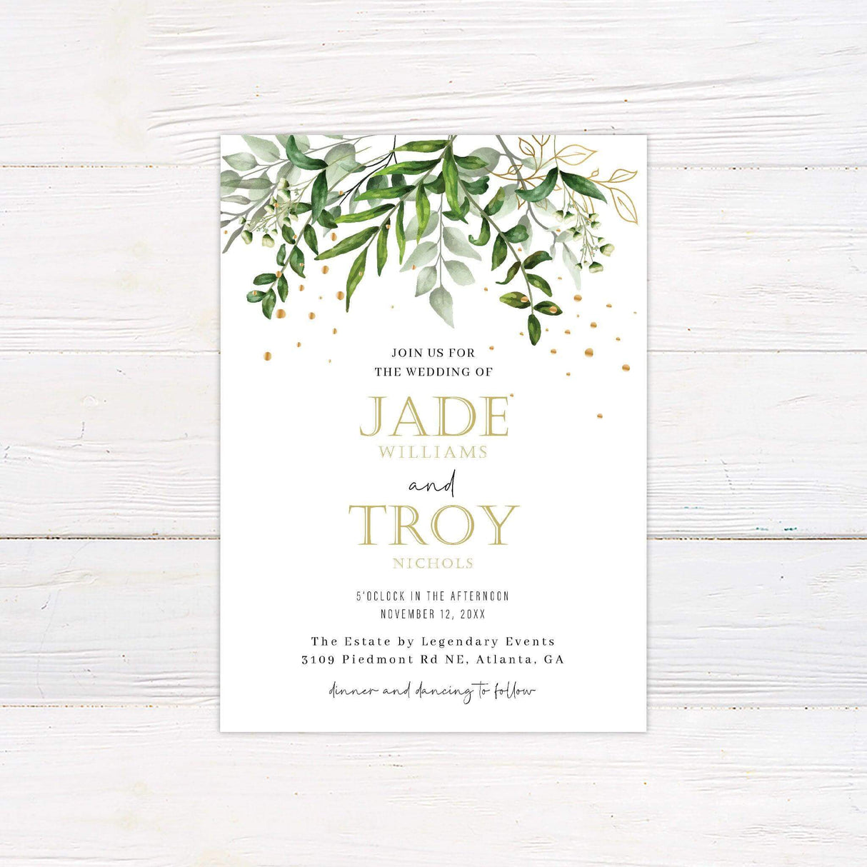 Watercolor eucalyptus wedding invitation with gold splatter accents and greenery border, featuring elegant serif and script fonts on a white background.