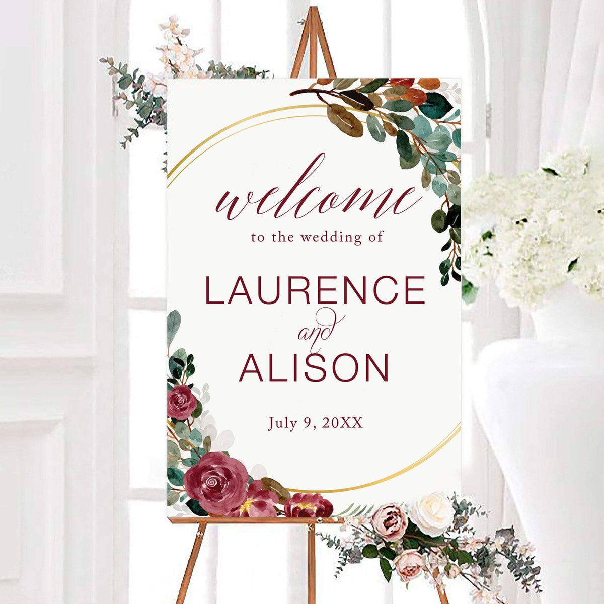 Personalized fall floral wreath wedding welcome sign featuring watercolor flowers, greenery, and elegant curved accents. The sign displays the couple’s names and wedding date in a spacious floral design.