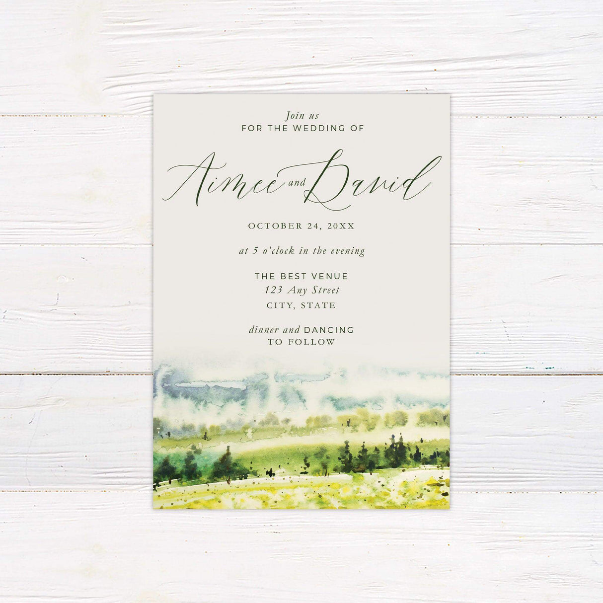 Elegant rustic wedding invitation with watercolor farmland landscape and green calligraphy for countryside-themed weddings.