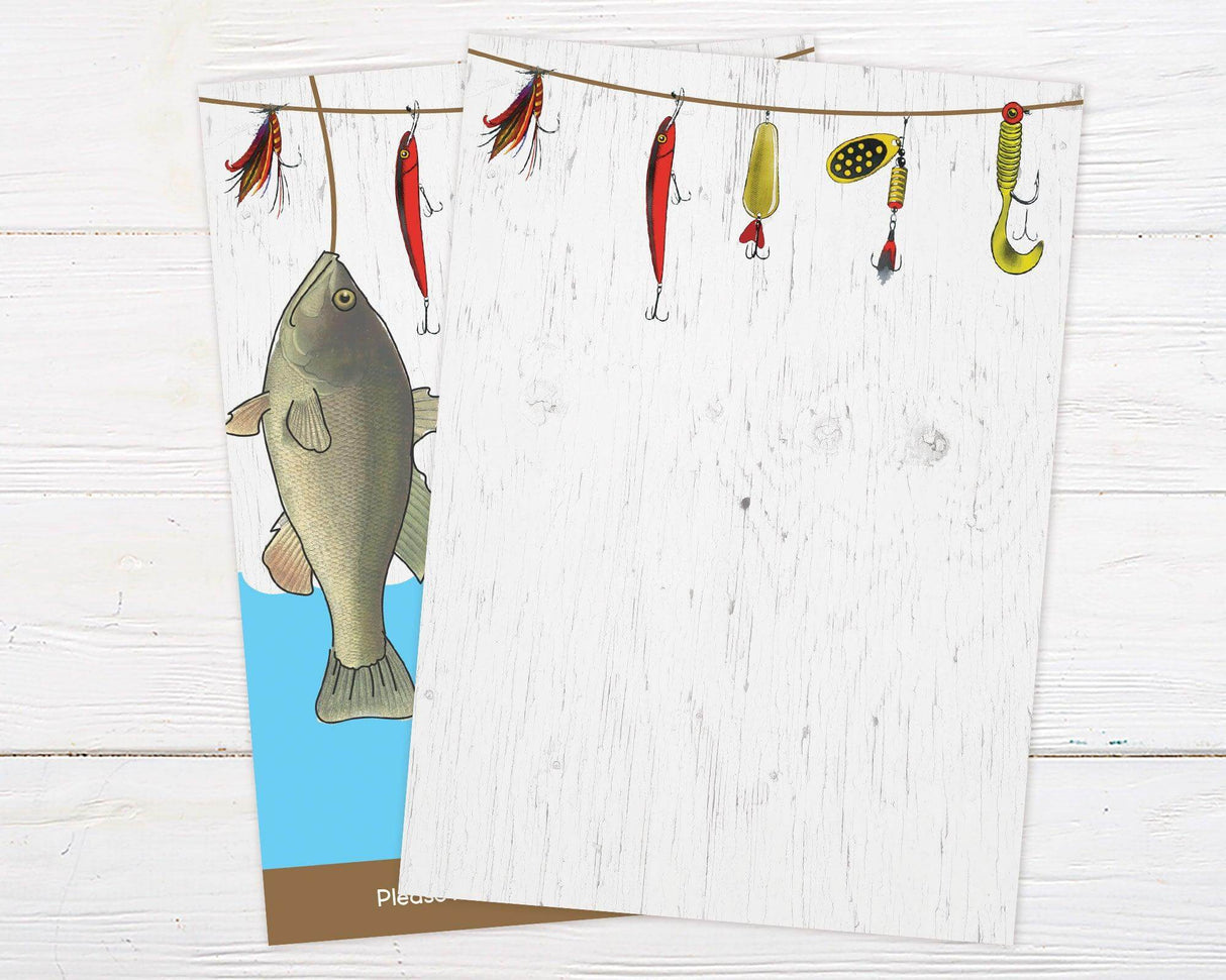 Fishing-themed birthday invitation featuring a large fish on a hook with colorful fishing lures hanging above. Bold red and blue text reads "It's O-Fish-Al" with space for the child's name and age. The lower section includes event details on a light blue background, with RSVP information at the bottom. Rustic wood texture adds to the outdoorsy feel. Back.