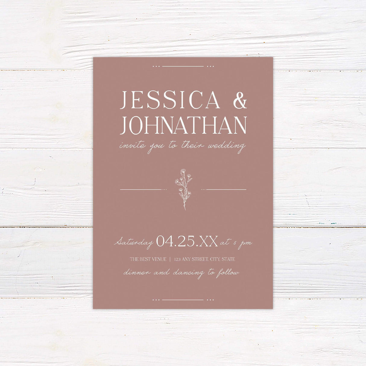 Minimalist wedding invitation back with mauve floral line art in the center and dotted linear accents on a white background