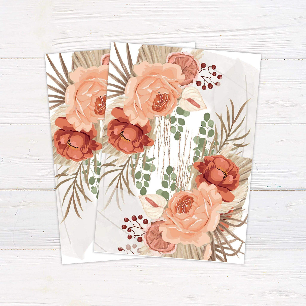 Boho wedding invitation with terracotta flowers, pampas grass, and modern fonts on a white background, ideal for rustic or desert-themed weddings - back