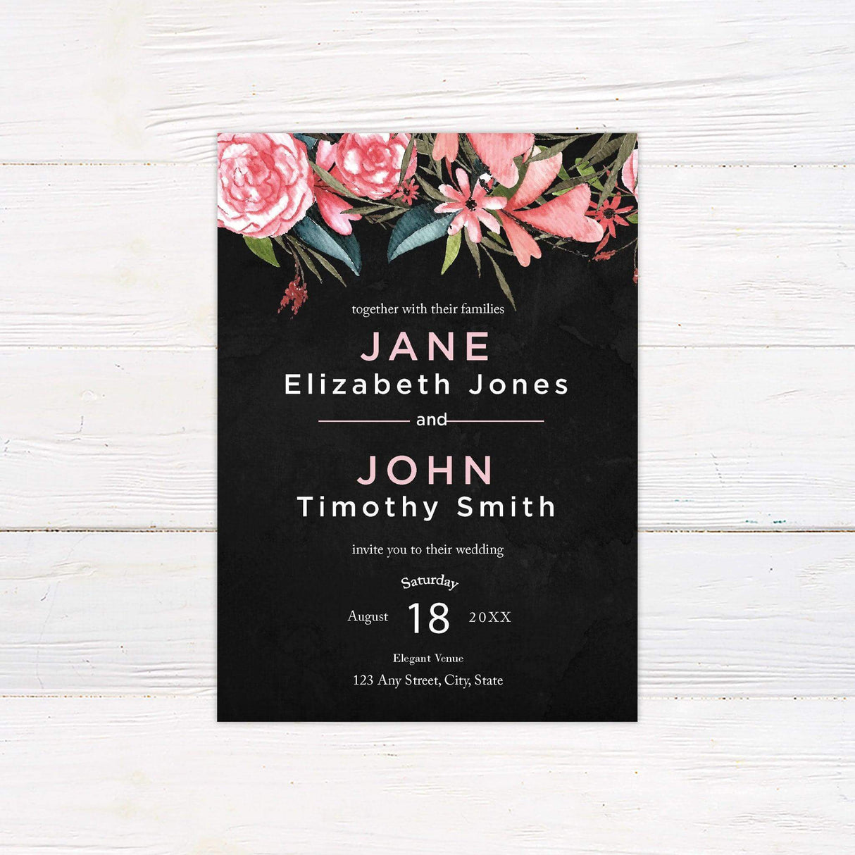 Dark background wedding invitation with pink and coral watercolor florals and modern typography in blush and white