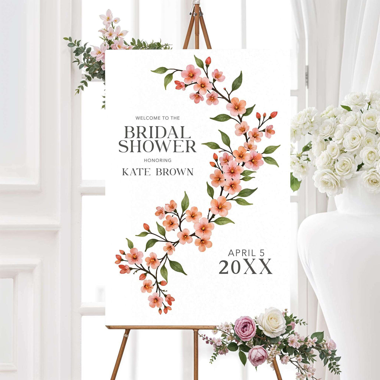 Bridal shower welcome sign featuring a watercolor cherry blossom vine with soft pink flowers and green leaves, printed on high-quality material for elegant event décor.