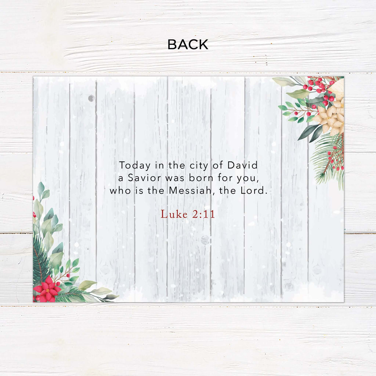This gatefold holiday card features a soft whitewashed wood background, festive watercolor florals, and space for multiple custom photos. The layout includes editable text areas and design elements that can be personalized with names, greetings, and special messages. - back.