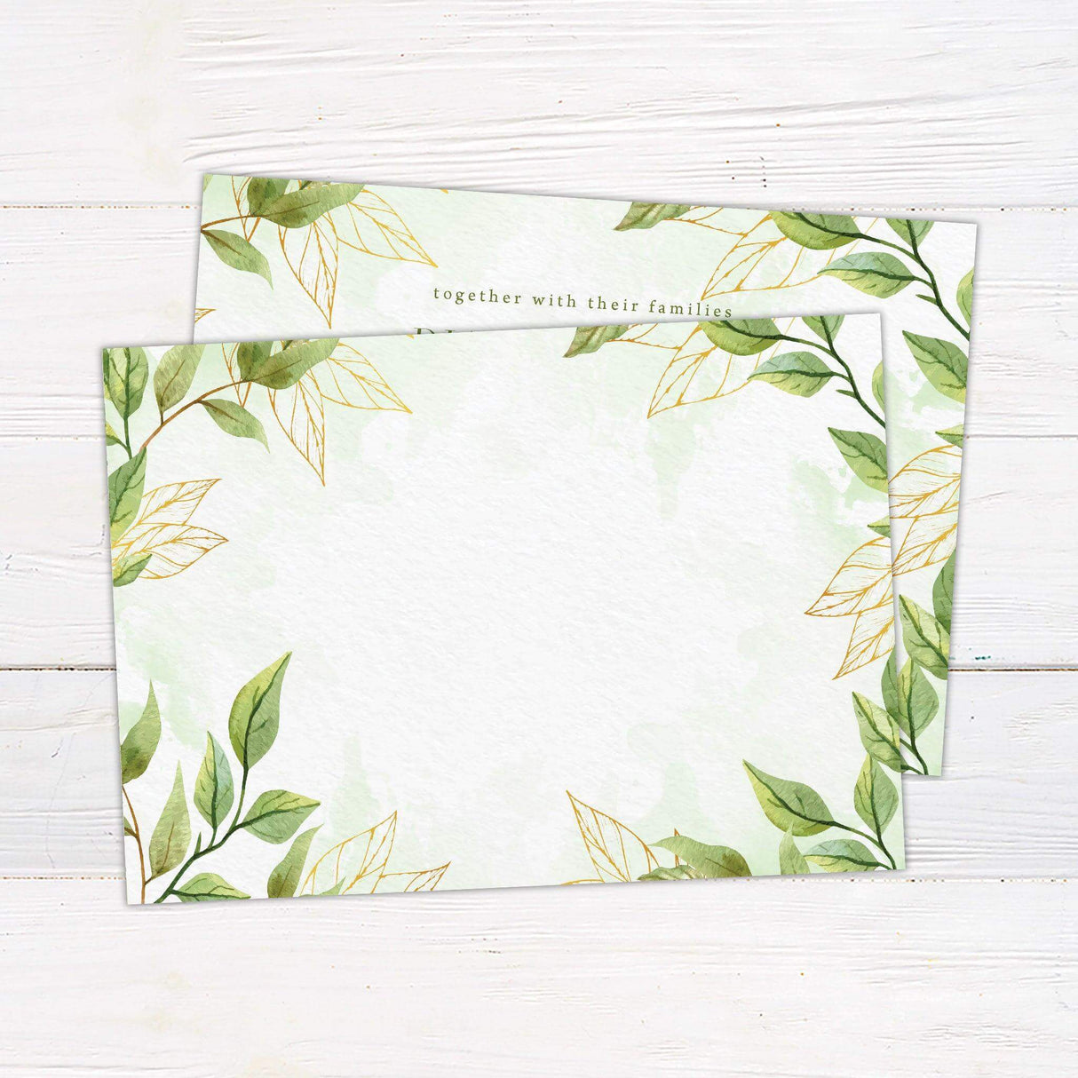 Elegant green botanical wedding invitation with watercolor leaf borders and gold accent lines on a soft mint background. back