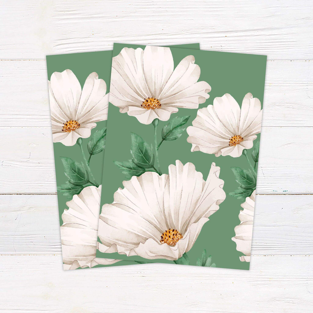 Printed wedding invitation with white Gerber daisy flowers on green background and elegant script text - back