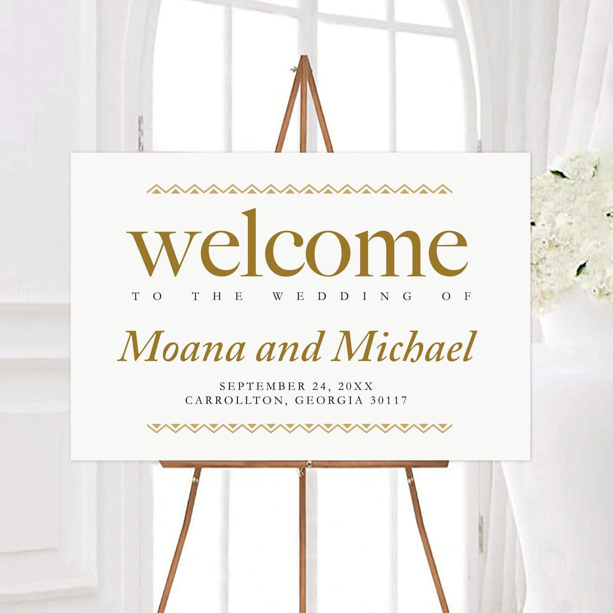 Personalized gold border wedding welcome sign featuring clean geometric border accents and sophisticated typography. The design displays the couple’s names, wedding date, and location in a modern layout.