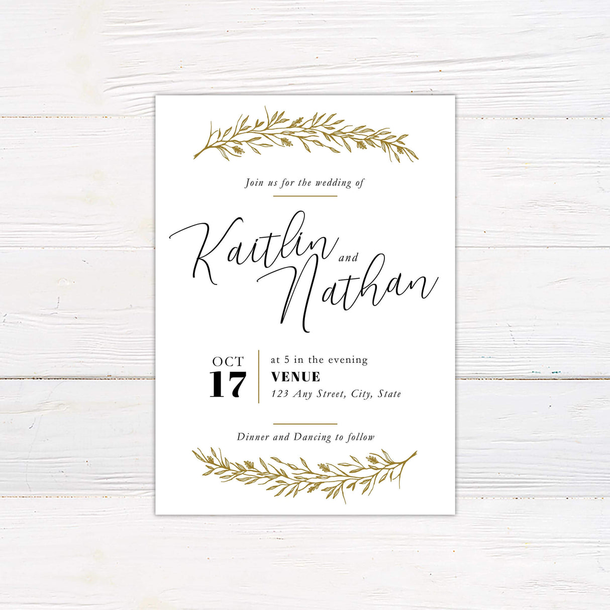 Elegant wedding invitation with hand-drawn gold botanical branches, minimalist cream background, and a mix of script and serif text.