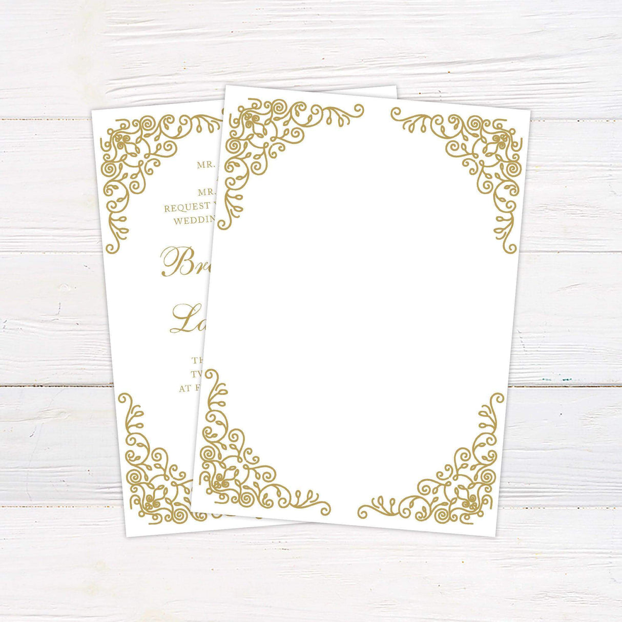 A wedding invitation with a classic white background features intricate gold filigree designs in the corners, creating an elegant and sophisticated frame. The text is arranged in a refined mix of serif and script fonts, highlighting the couple’s names and event details, including the date, time, and venue. This design exudes timeless luxury, making it perfect for formal, vintage, or traditional wedding celebrations. Back.