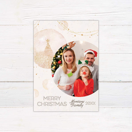 Elegant Christmas card with gold glitter accents and a circular photo frame. Customize with your own family photo and personalized holiday message.