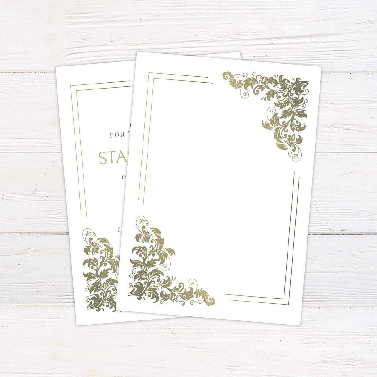 Elegant wedding invitation with gold to green baroque floral corner designs and serif fonts on a white background - back