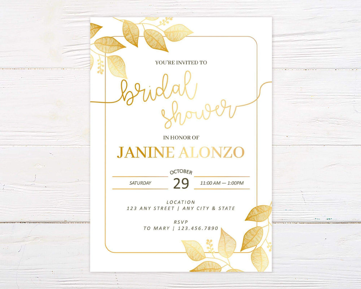 A gold leaves bridal shower invitation with a white background and elegant botanical frame. The design features soft gold foliage and modern script text.