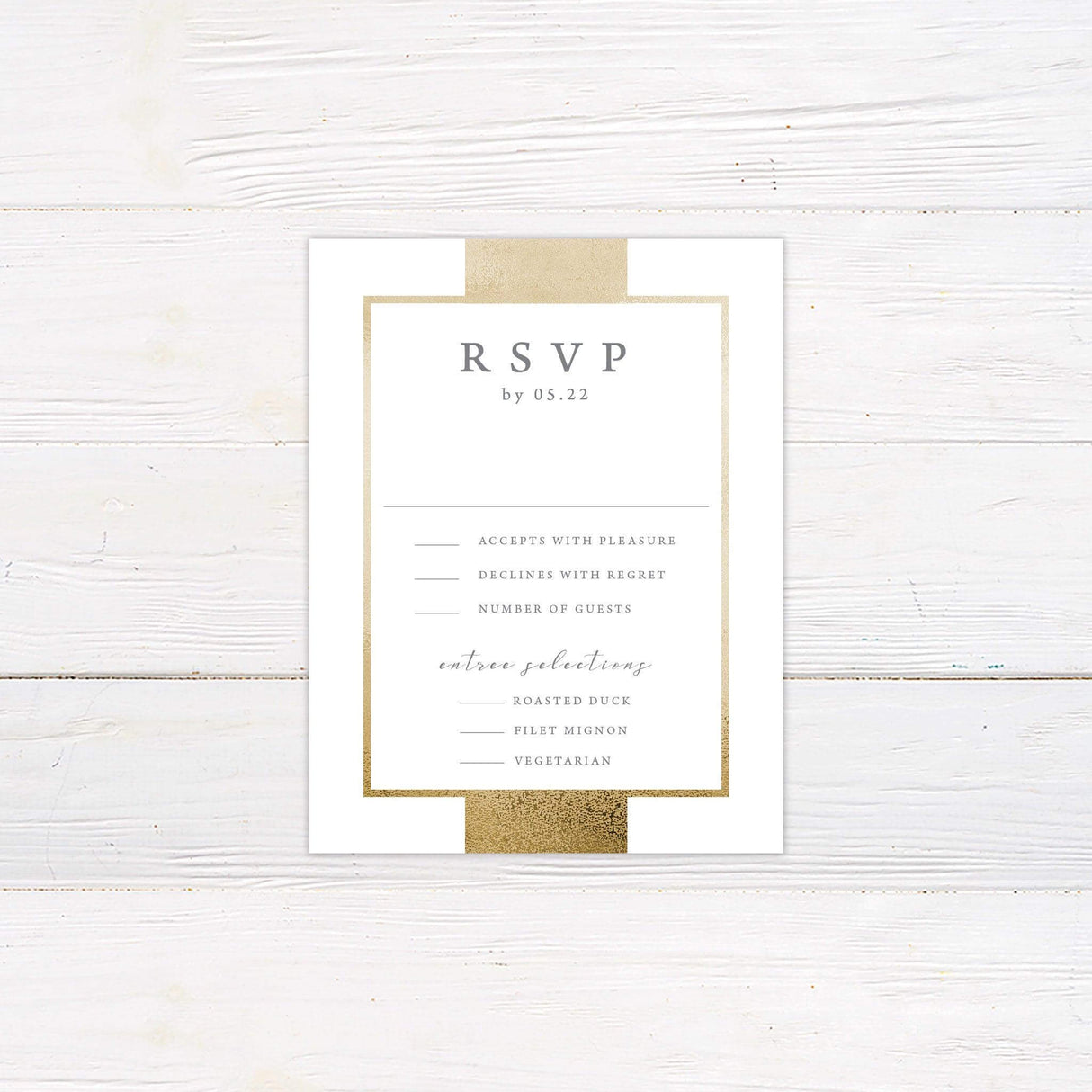 A rsvp with a white background features a modern and elegant design with a metallic gold border. The text is arranged in a refined mix of serif and script fonts, creating a sophisticated and timeless look. Event details, including the date, time, and venue, are centered for a structured and polished appearance. This design exudes luxury and simplicity, making it perfect for formal, modern, or classic wedding celebrations.
