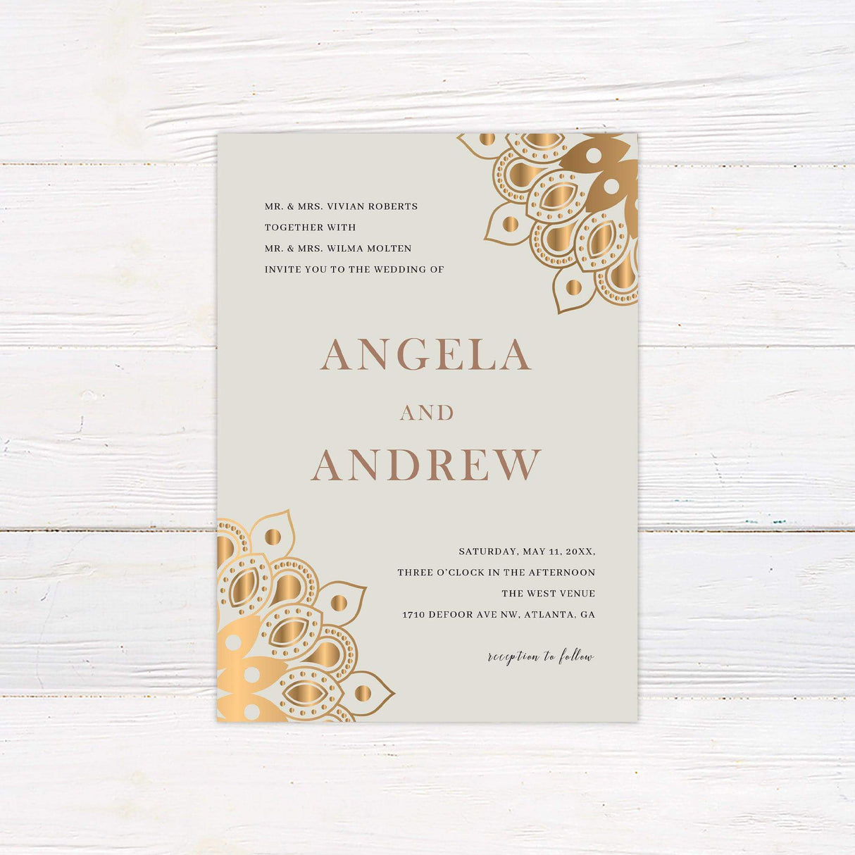 Wedding invitation with gold mandala pattern in corners, rose gold serif text on cream background, minimalist Indian-inspired design