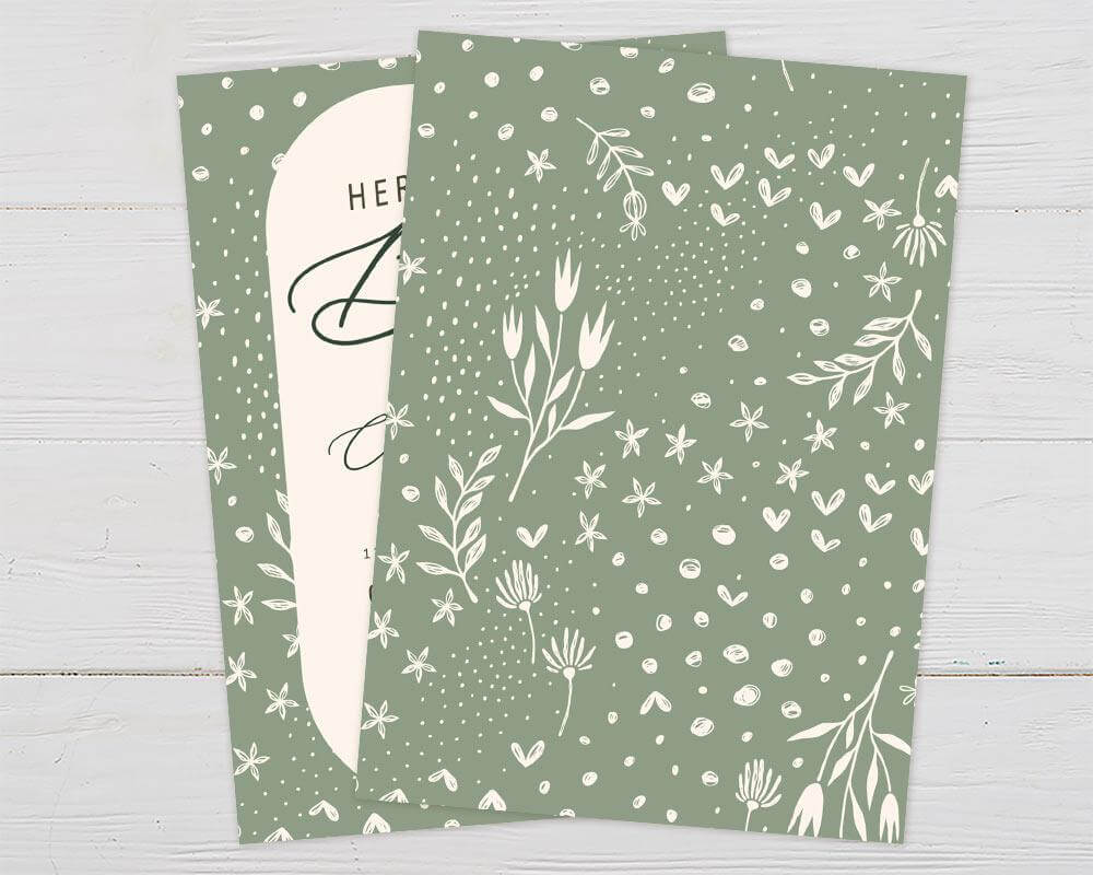 A sage green Green Border Invitation with an arch-shaped center and floral border. The design features botanical accents and elegant script text. - back.