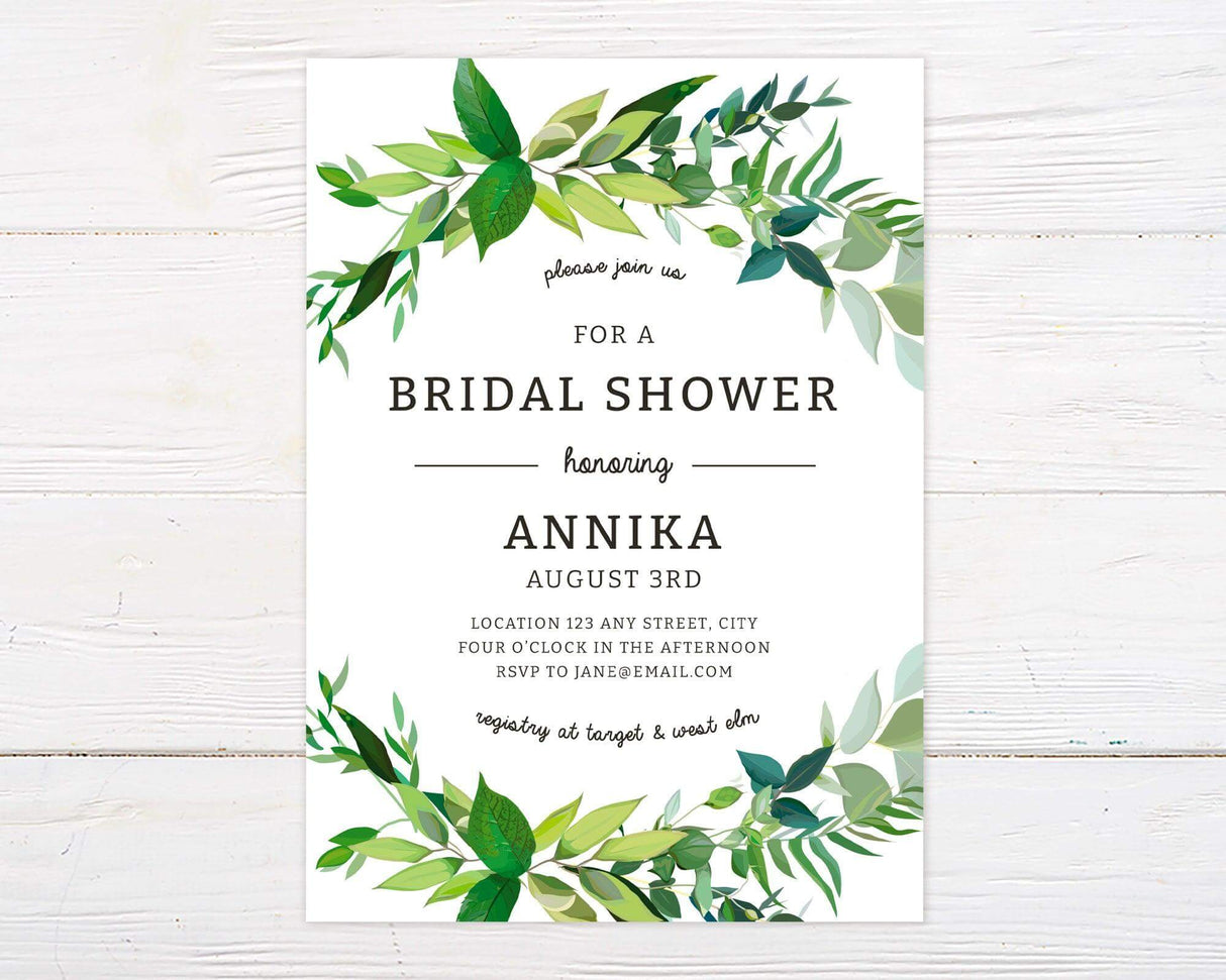 Elegant botanical bridal shower invitation with green leaves design, featuring RSVP details and event information in a sophisticated layout.