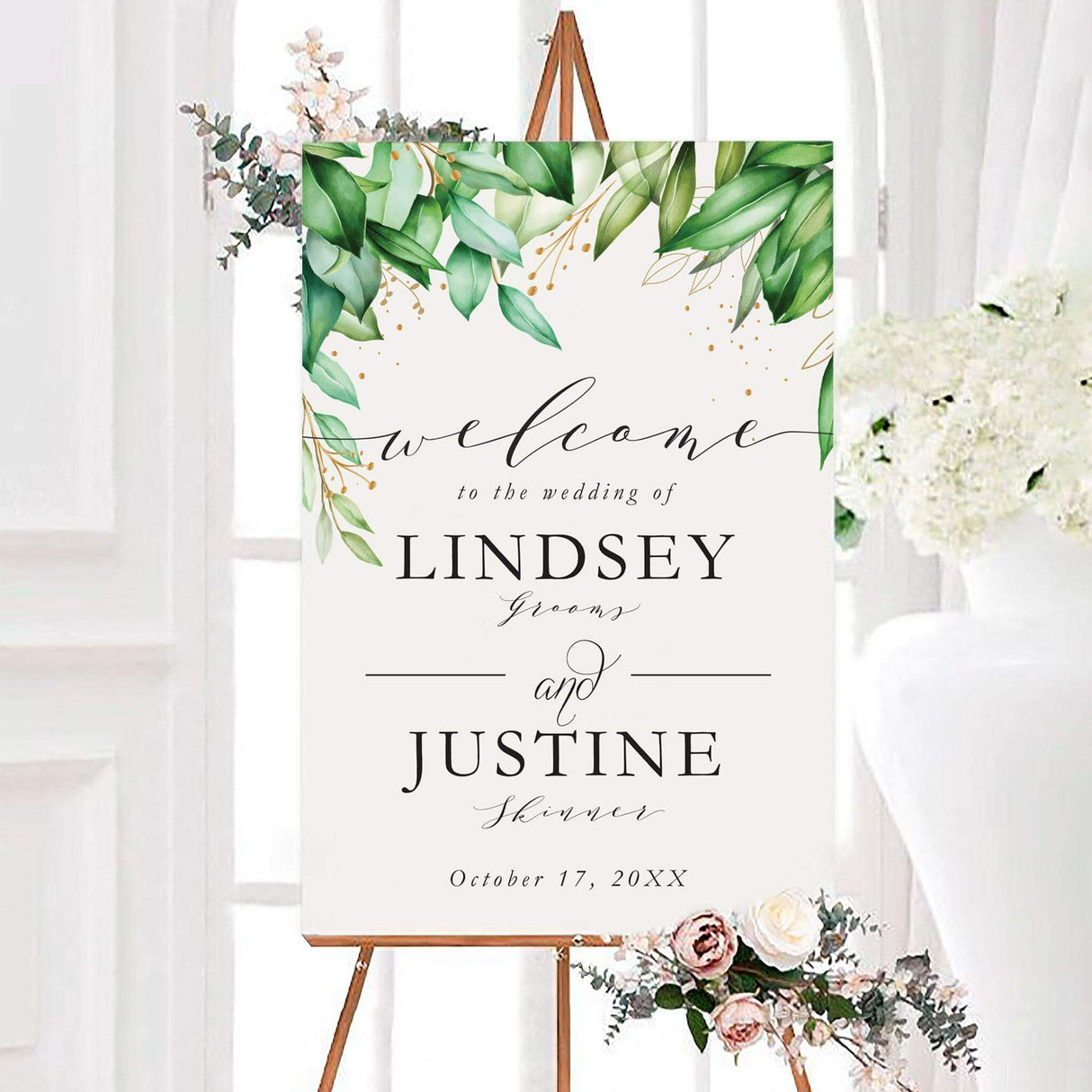 Elegant greenery and gold wedding welcome sign featuring watercolor green leaves with delicate gold accents and classic black lettering. The sign is personalized with the couple’s names and wedding date.