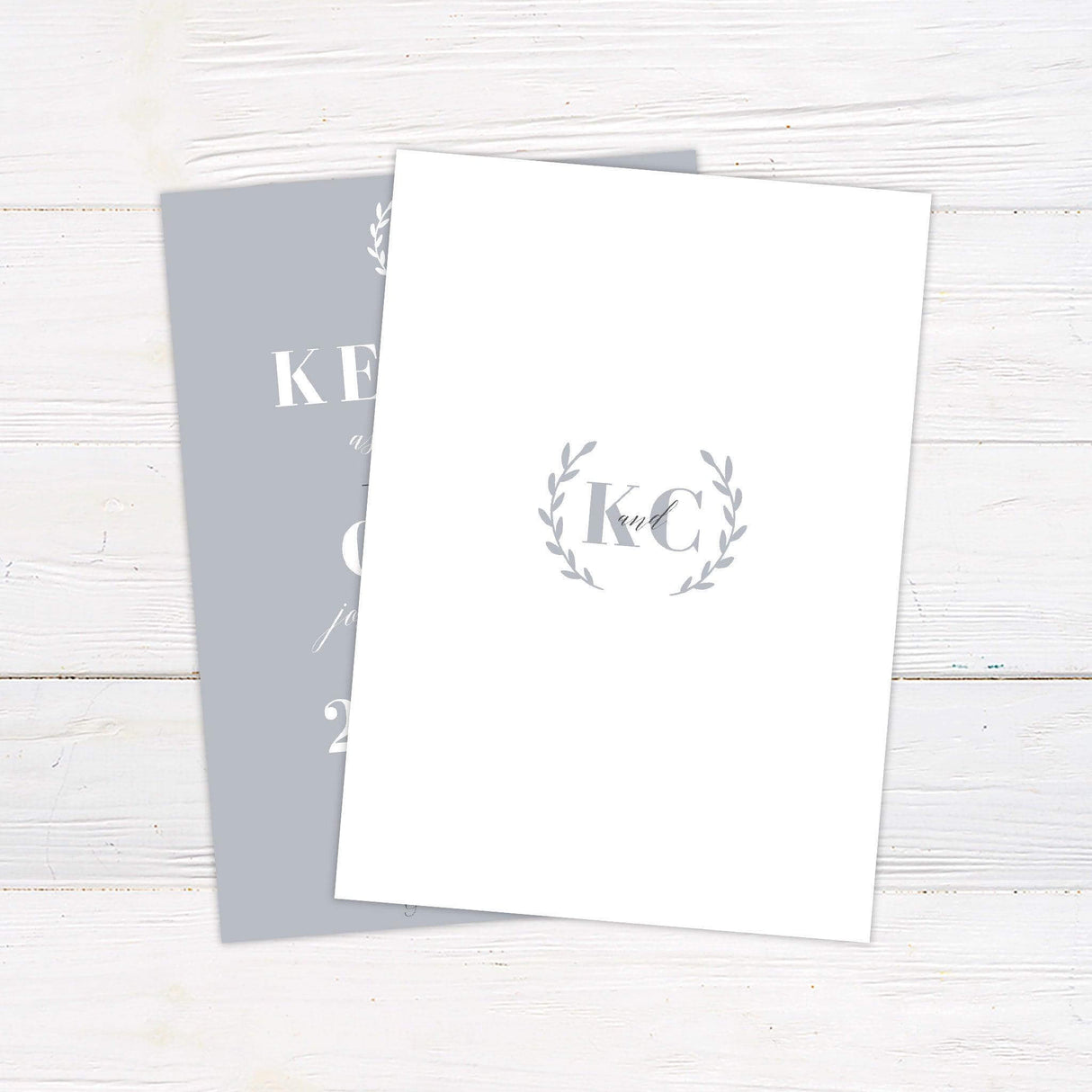 Grey minimalist wedding invitation with elegant serif and script fonts, customizable layout for wedding date, time, venue, and event details - back