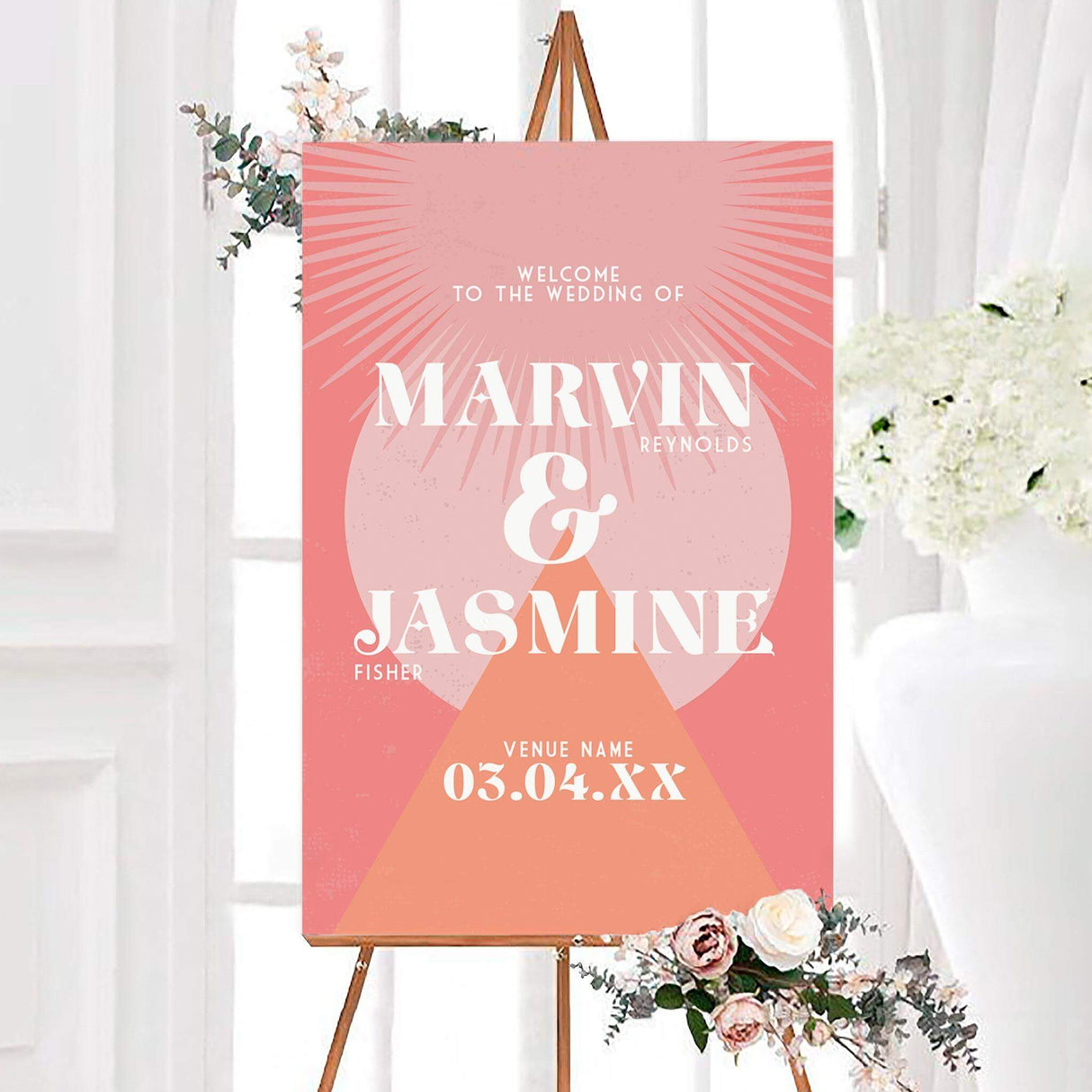 Groovy geometric wedding welcome sign with pink and coral abstract shapes, retro sunburst details, and bold white typography. The personalized design features the couple’s names, venue, and wedding date.