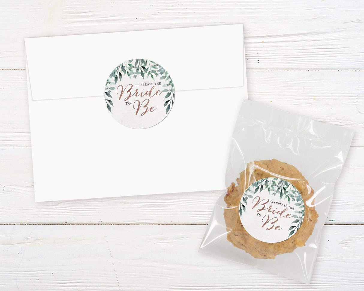 A hanging leaves bridal shower invitation sticker with green leafy branches around the edges. The design uses soft neutral colors and elegant script text.