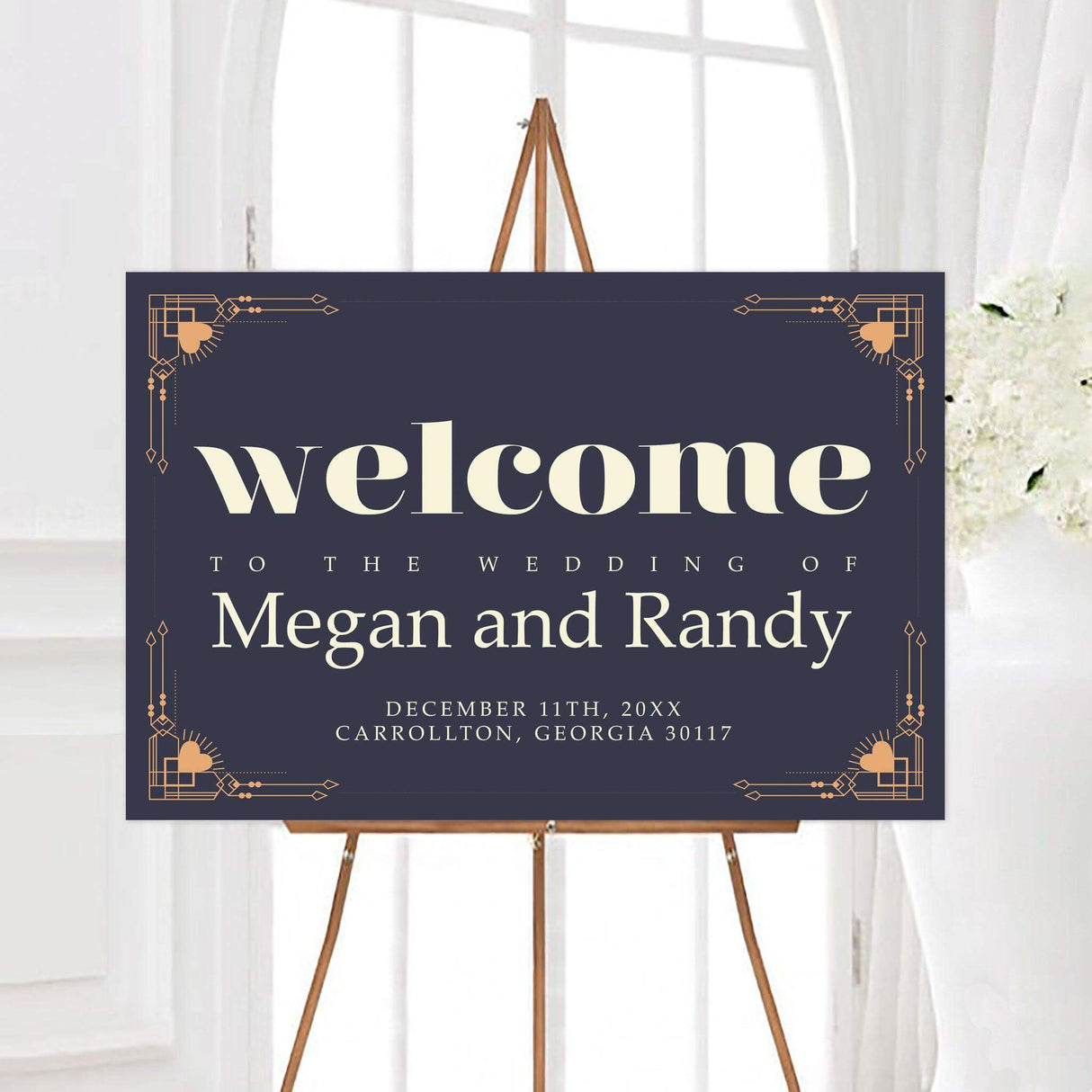 Heart Deco wedding welcome sign with a dark background, geometric corner details, heart accents, and elegant typography. Personalized wedding signage features the couple’s names, wedding date, and event details.