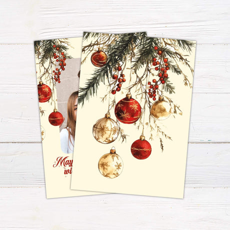 Christmas photo card with pine branches, red ornaments, and a festive family selfie, featuring the text “May your holidays sparkle with joy and laughter!”