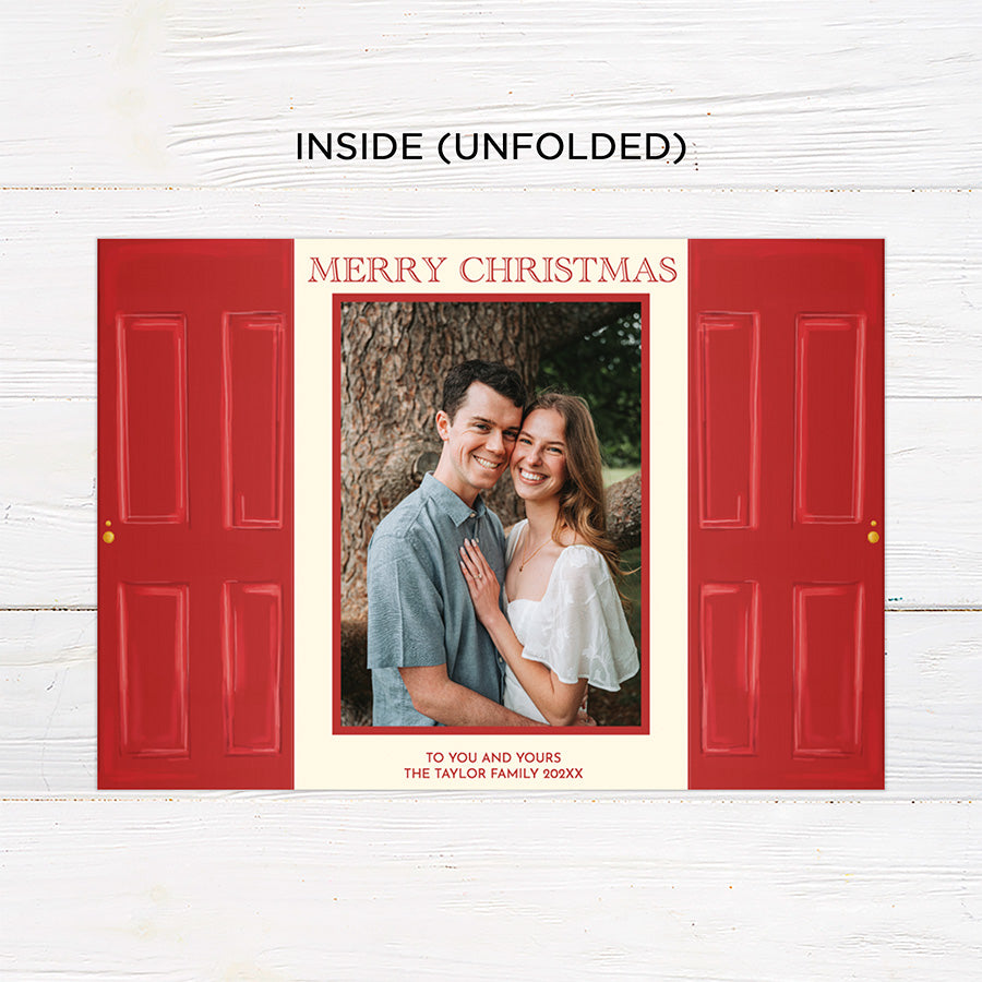 Personalized Home for the Holidays Christmas gatefold photo card featuring festive red double doors decorated with evergreen wreaths and customizable family photos. The folding holiday card opens to reveal a large photo and personalized Christmas greeting with an additional four-photo collage. Two-photo variant. - inside unfolded
