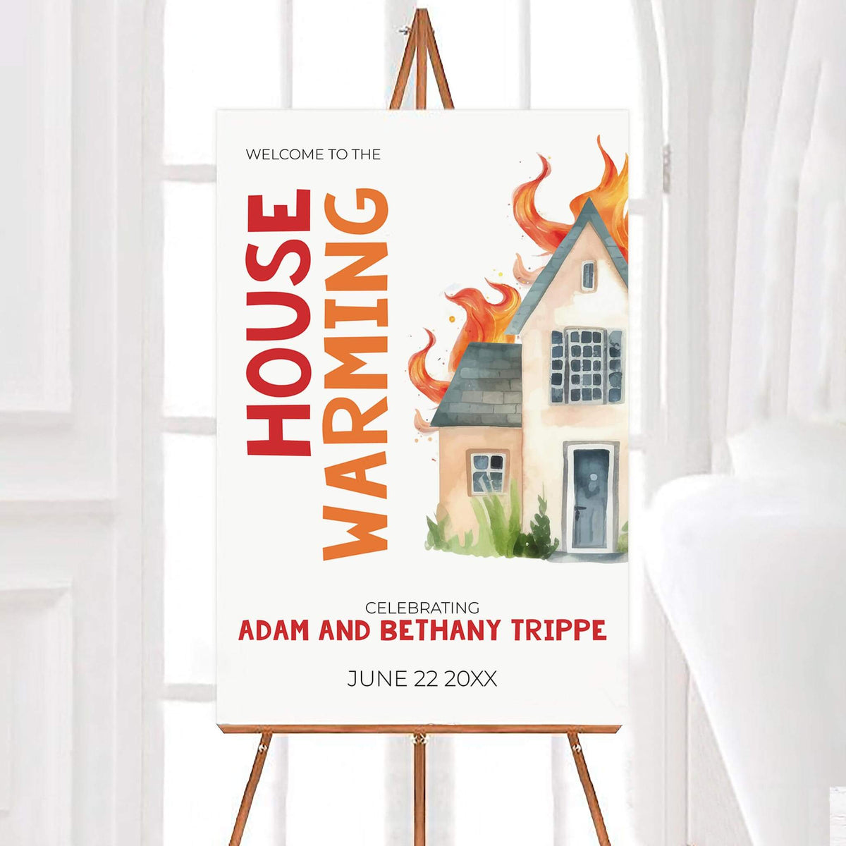 Funny housewarming house on fire party welcome sign featuring a watercolor illustration of a house surrounded by orange and red flames. Bold vertical housewarming lettering appears beside the illustration with personalized names and an event date below.