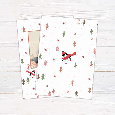Ice Skating Christmas card with family photo frame, penguin illustrations in scarves, snowflakes, trees, and personalized Merry Christmas message. - back.
