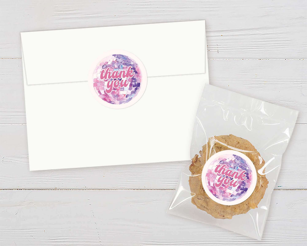 Thank you sticker on an envelope and cookie bag, featuring soft pastel colors.