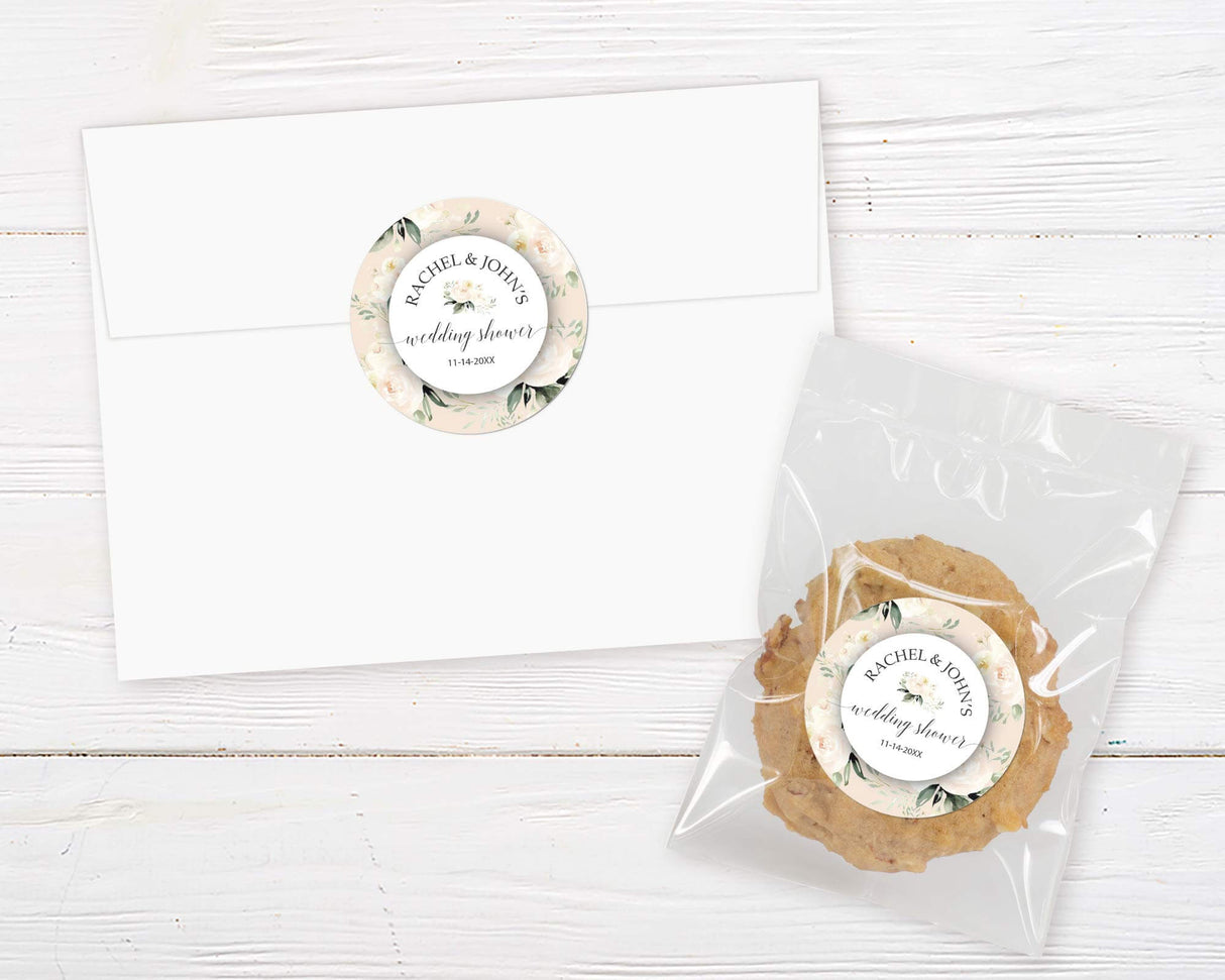 Ivory Peonies Shower Invitation set with envelope and cookie favor, featuring elegant ivory floral design for brides-to-be.