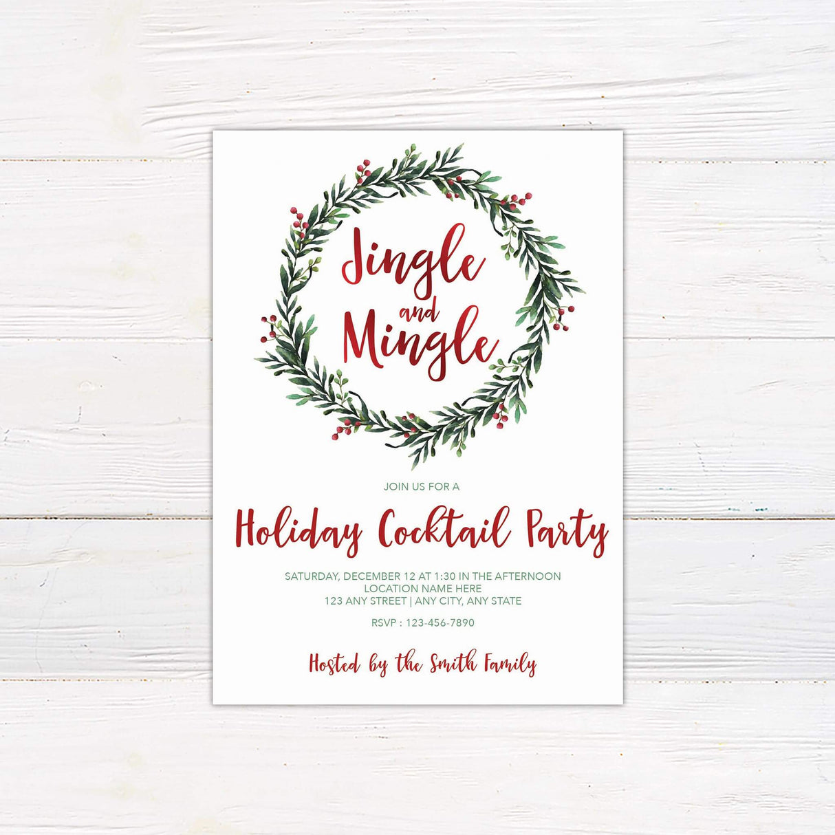 Holiday invitation with the words "Jingle and Mingle" inside a watercolor wreath of greenery and red berries. Below it invites guests to a festive cocktail party with event details in red and green lettering.