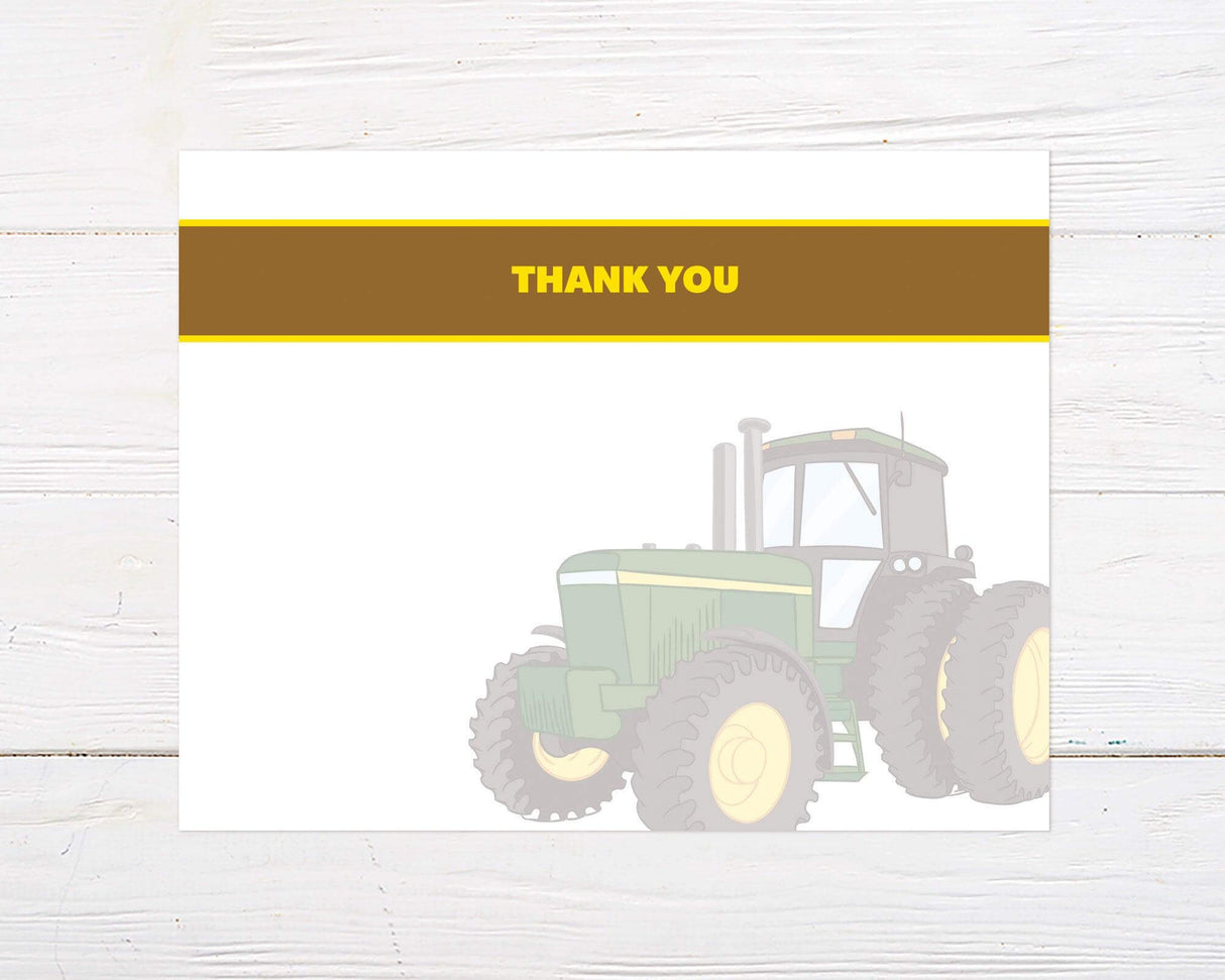 A thank-you card with a green tractor design and a brown and yellow banner at the top. The layout is clean with space to write a message below.